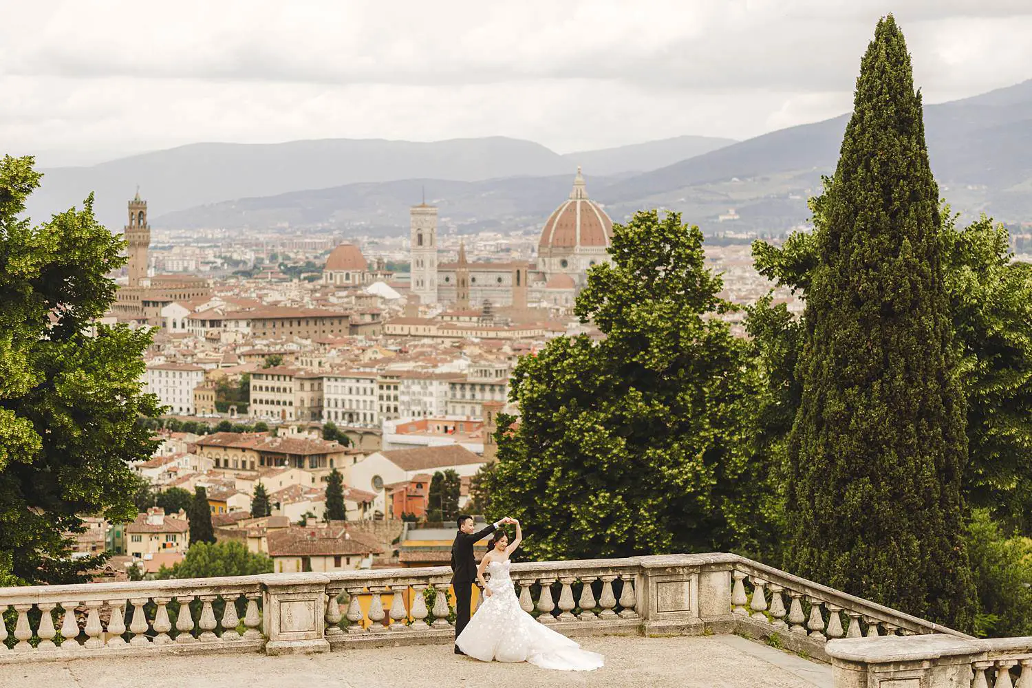 Bride and groom pre-wedding couple shoot in the panoramic views at San Miniato al Monte