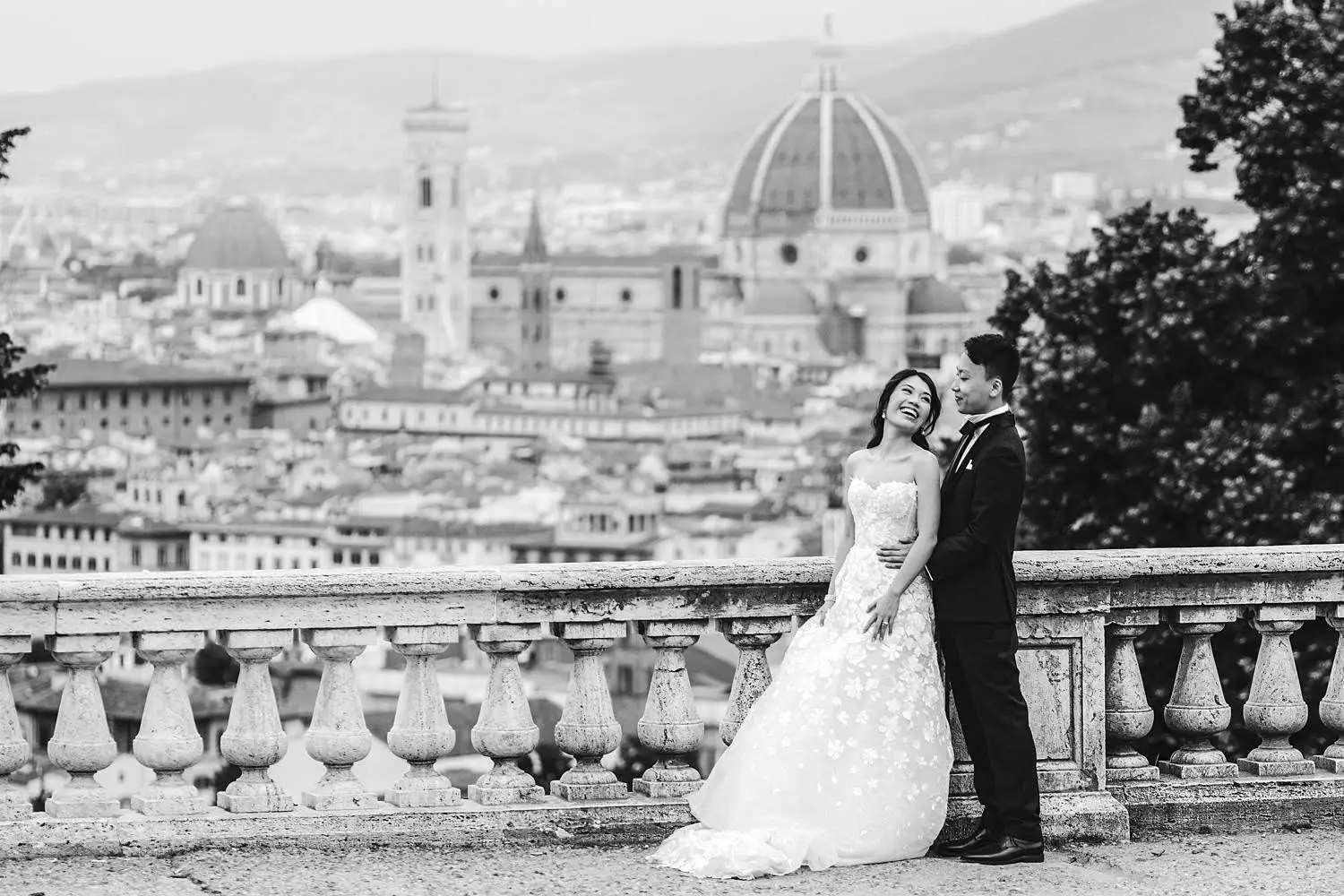 Bride and groom candid pre-wedding shoot in the panoramic views at San Miniato al Monte