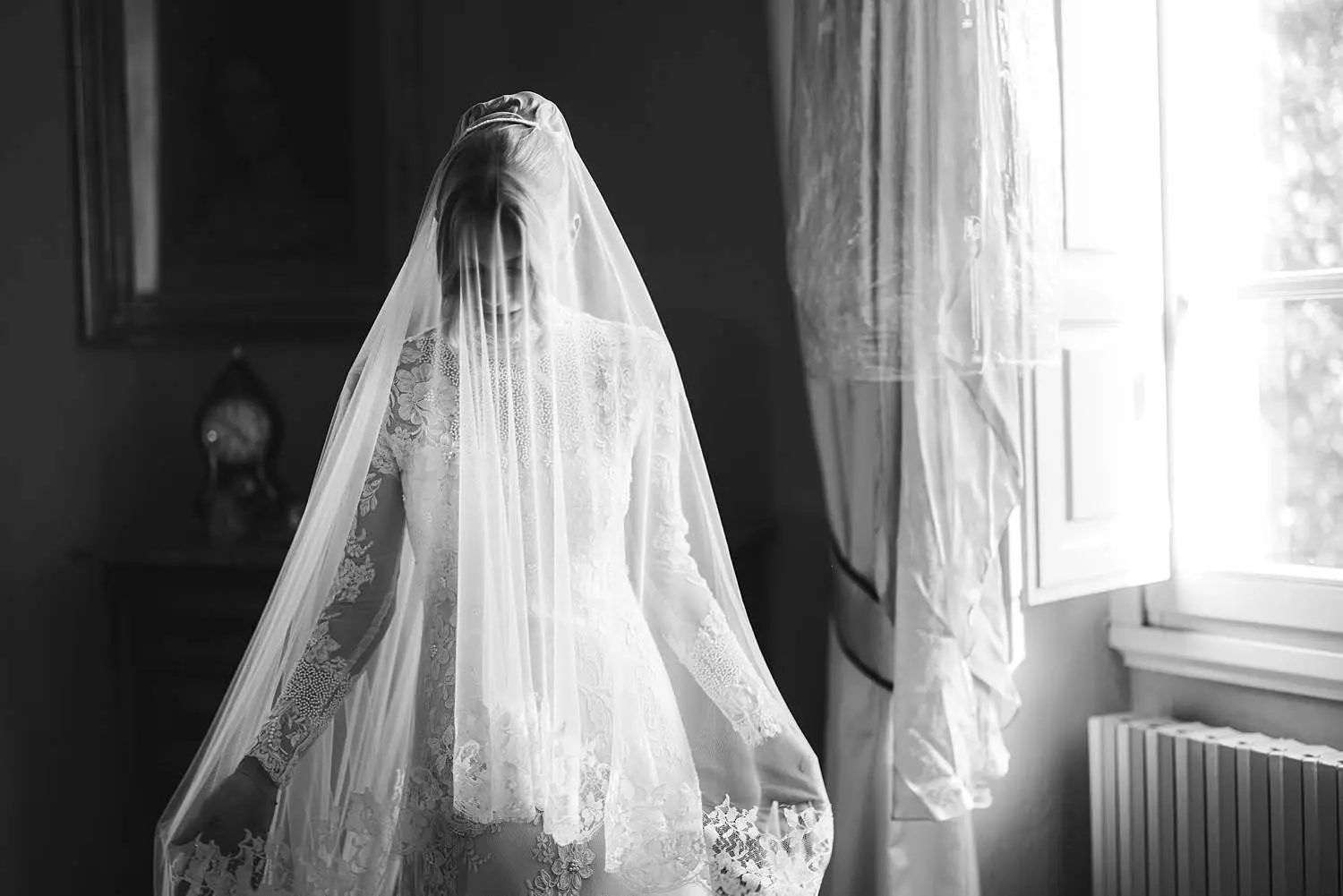 Elegant and beautiful bride candid portrait at Villa Belvedere in Loro Ciuffenna