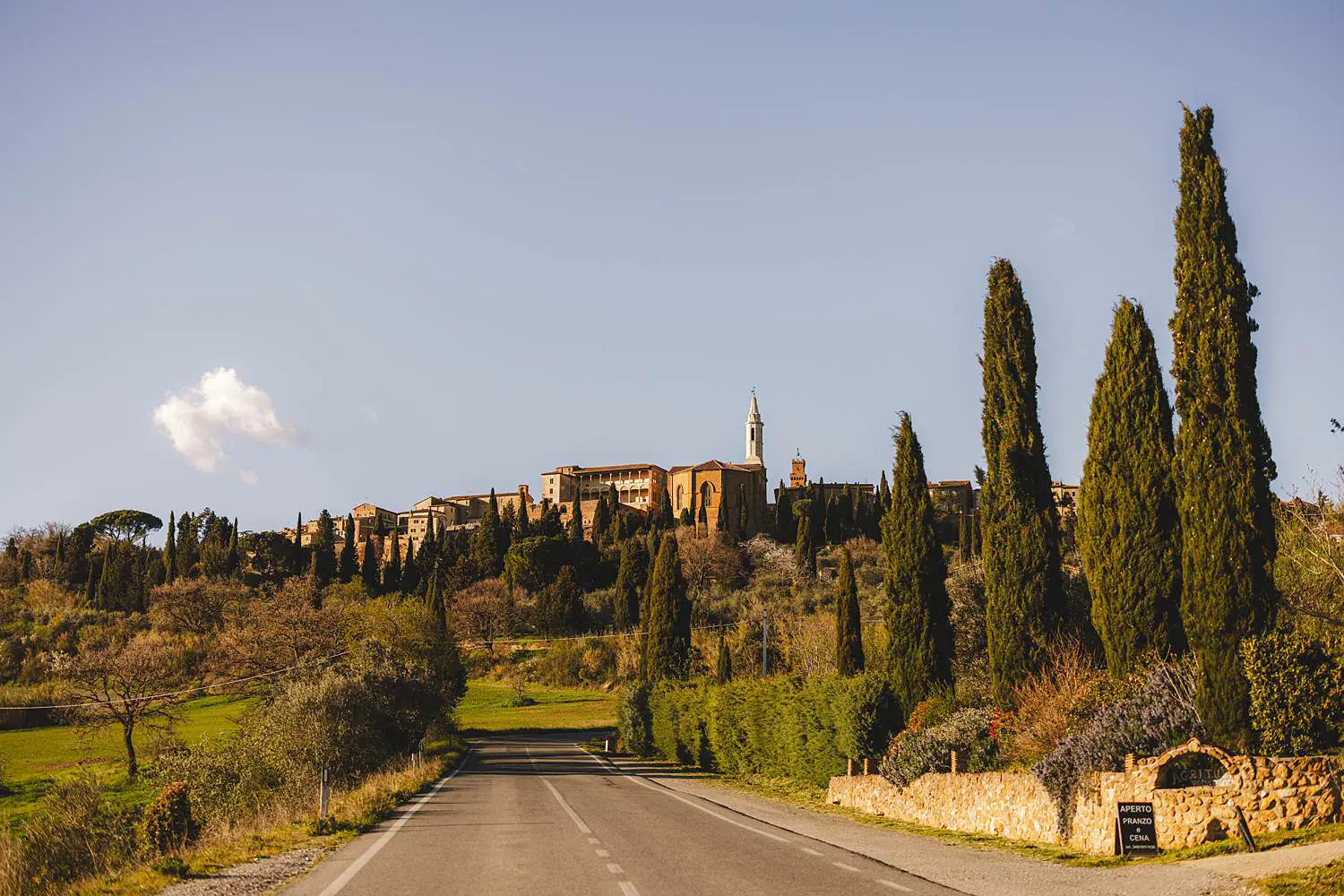 Iconic rolling hills of the Val d’Orcia near Pienza a perfect place for a couple photo shoot