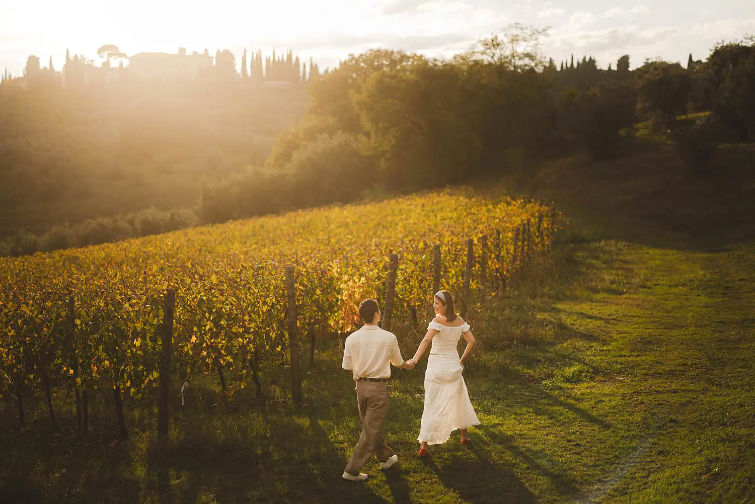 Engagement photos at Castello del Nero and sunset in the vineyards