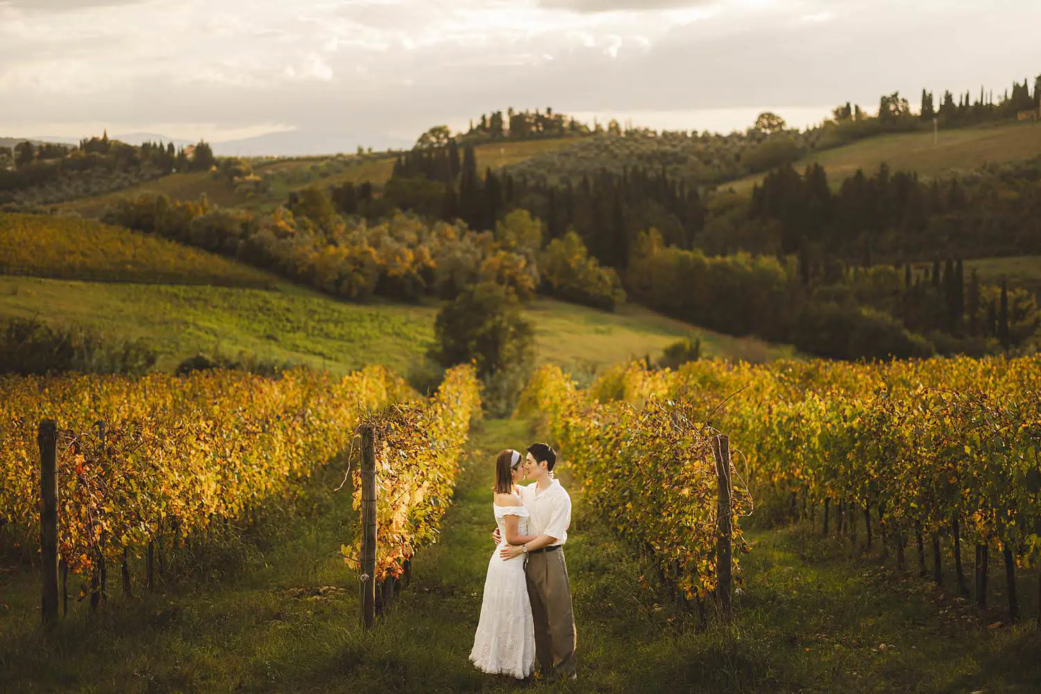 Engagement couple session at Castello del Nero and sunset in the vineyards