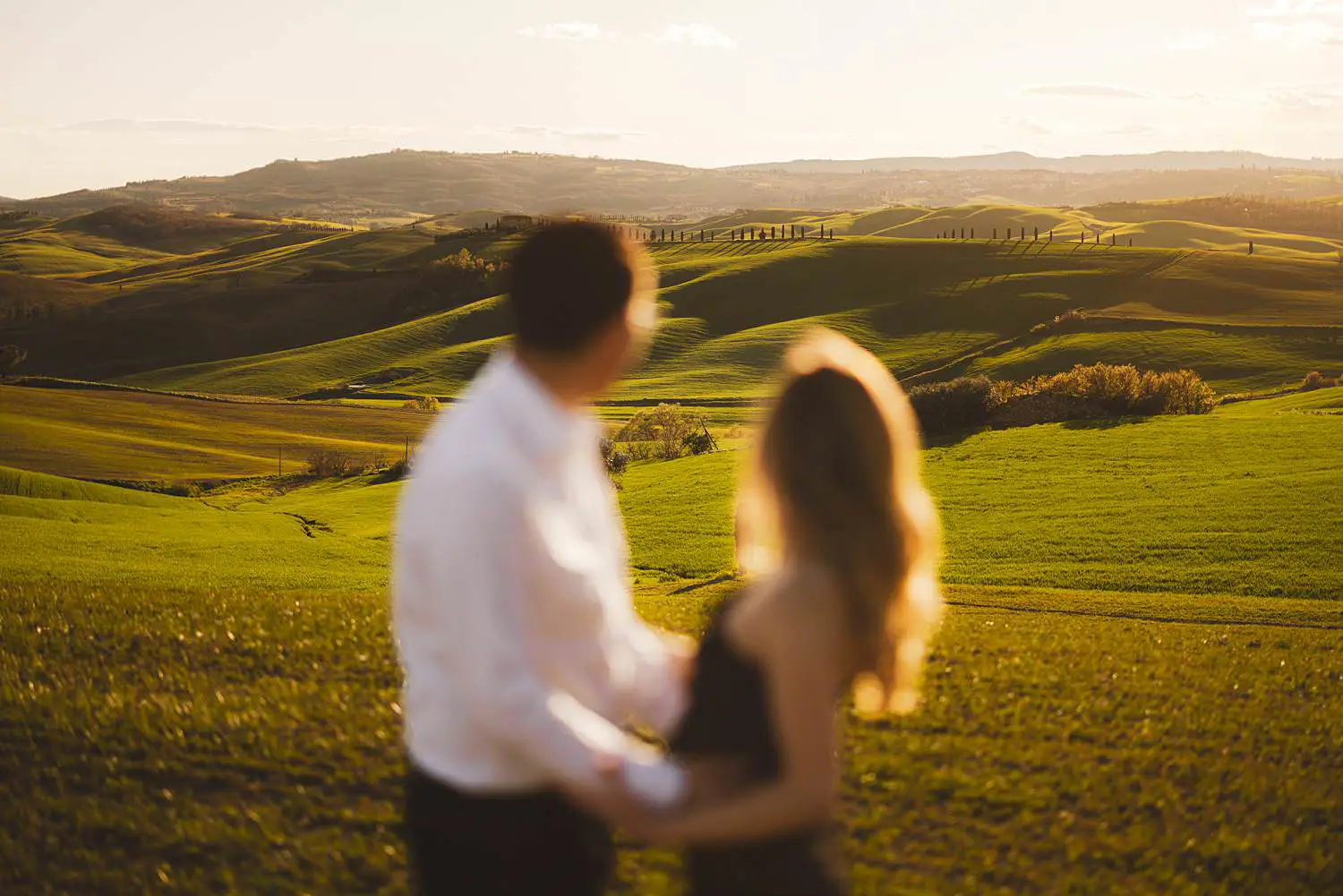 Golden hour portraits under warm light of Pienza in the most iconic landscapes in Tuscany