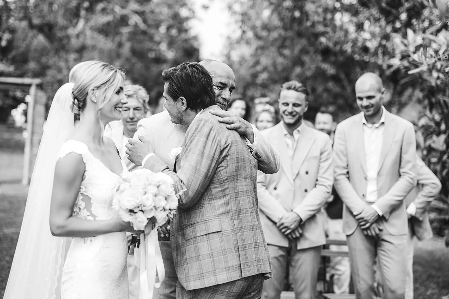 Emotional wedding moment during outdoor intimate ceremony at Agriturismo Quercia al Poggio