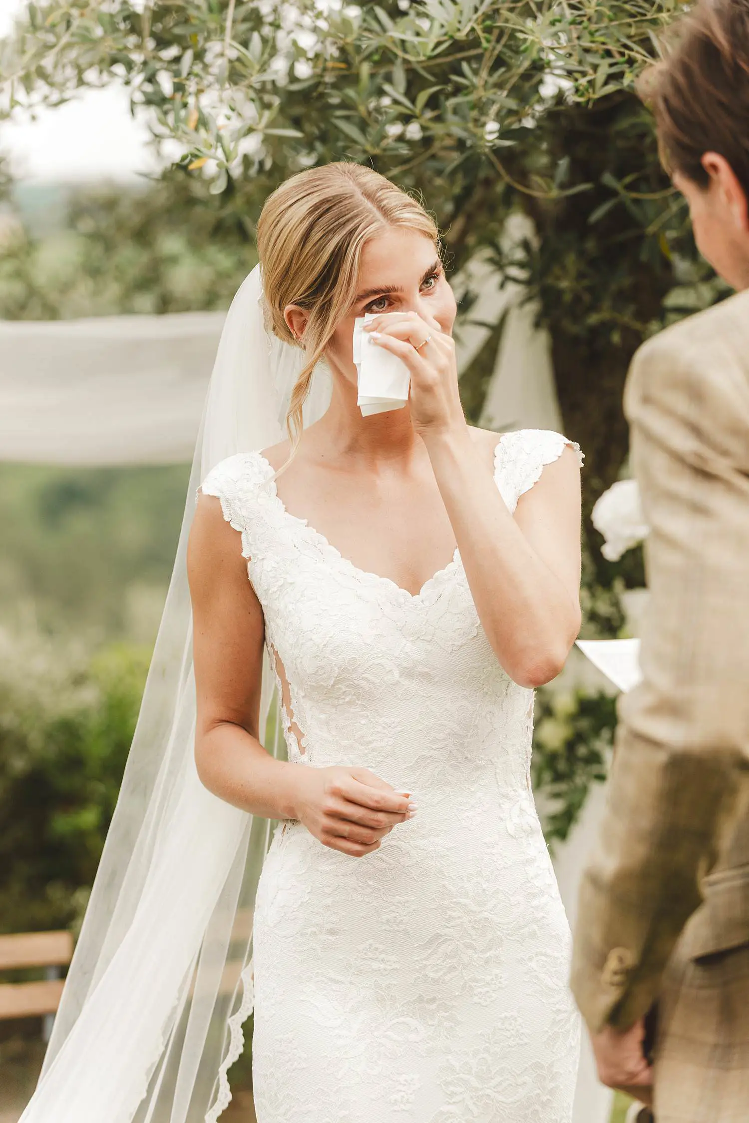 Lovely moment during outdoor emotional wedding ceremony at Quercia al Poggio