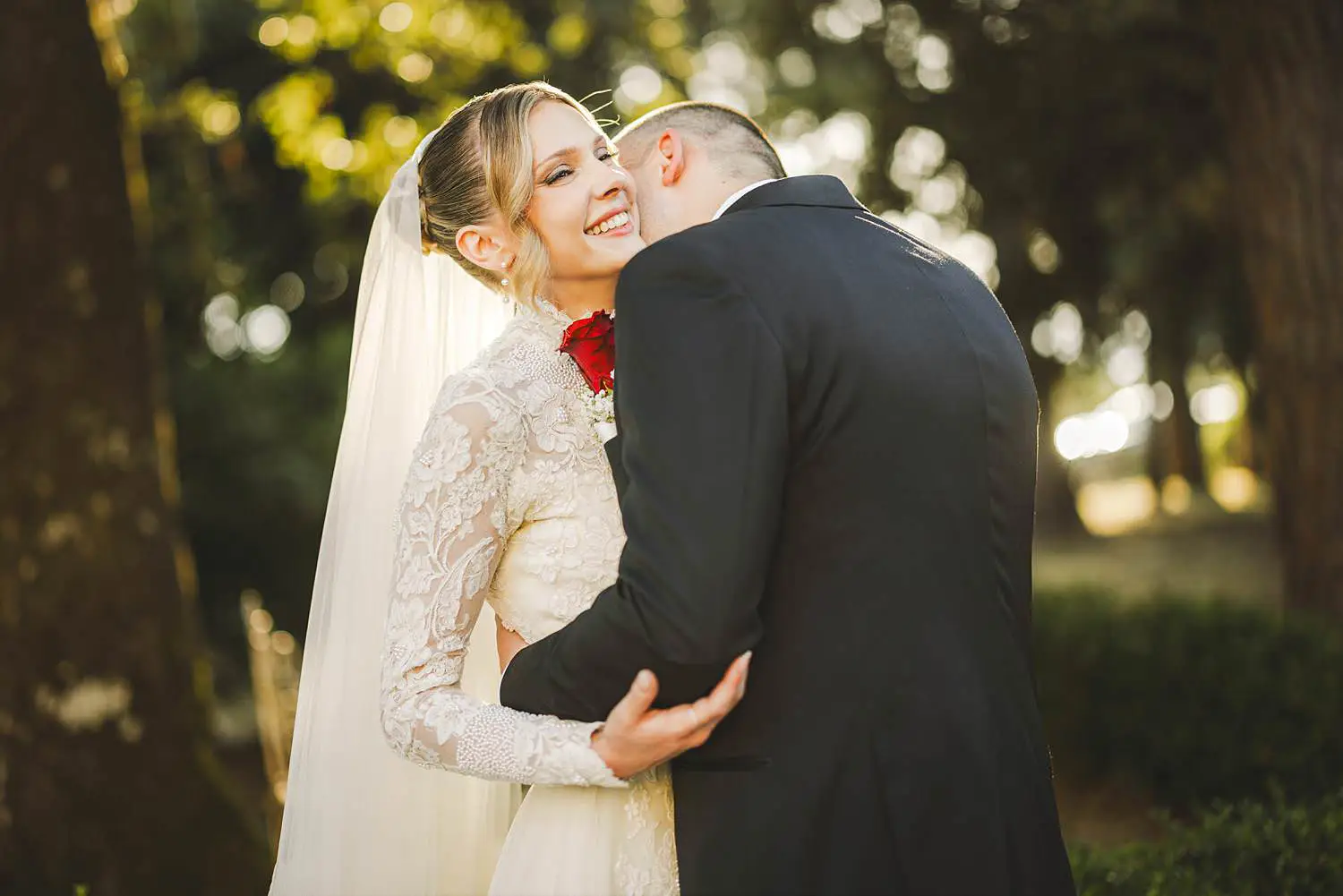 Bride and groom elegant portrait capturing their connection against the soft Tuscan warm light at Villa Belvedere