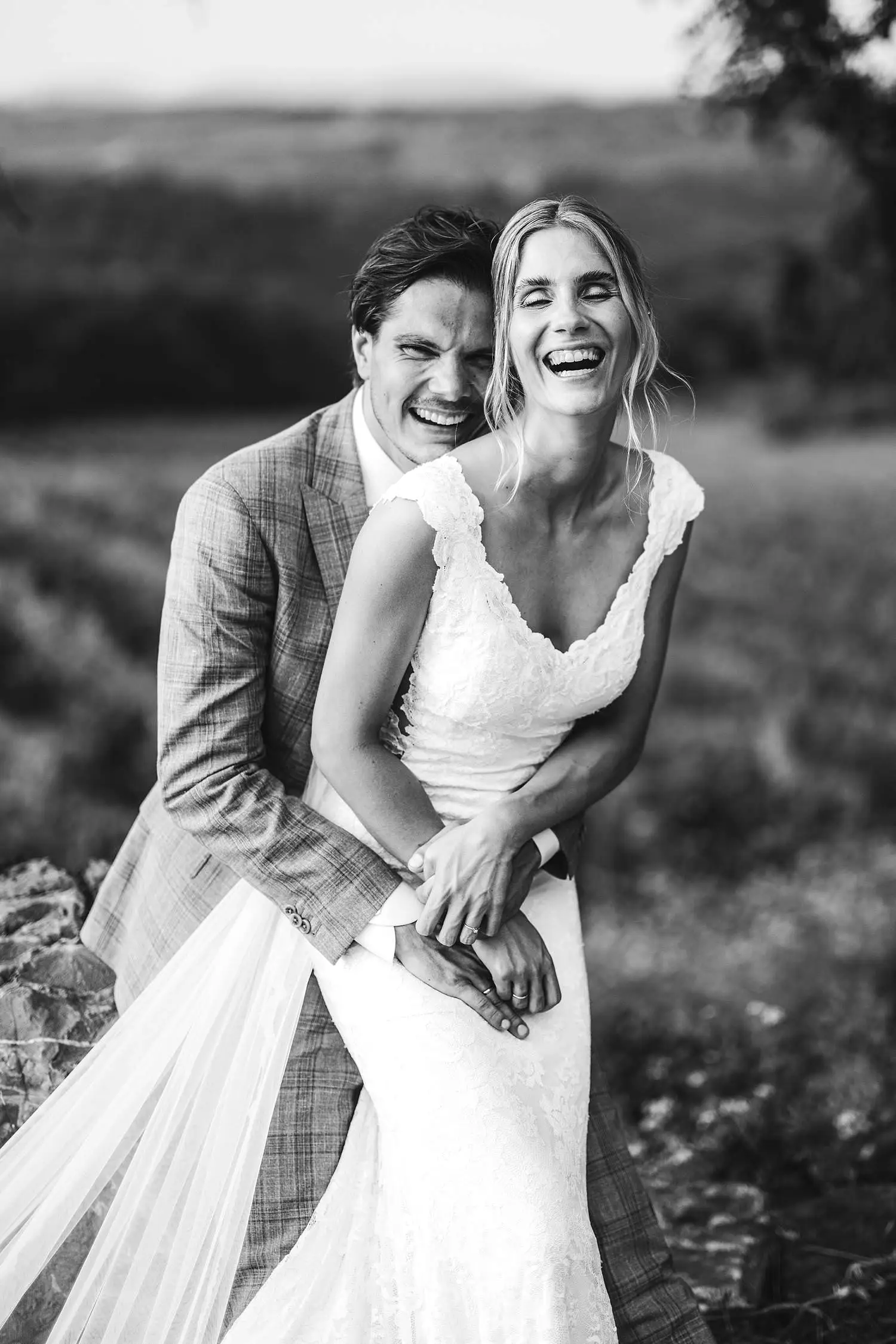 A timeless bride groom portrait overlooking Chianti vineyard at Agriturismo Quercia al Poggio