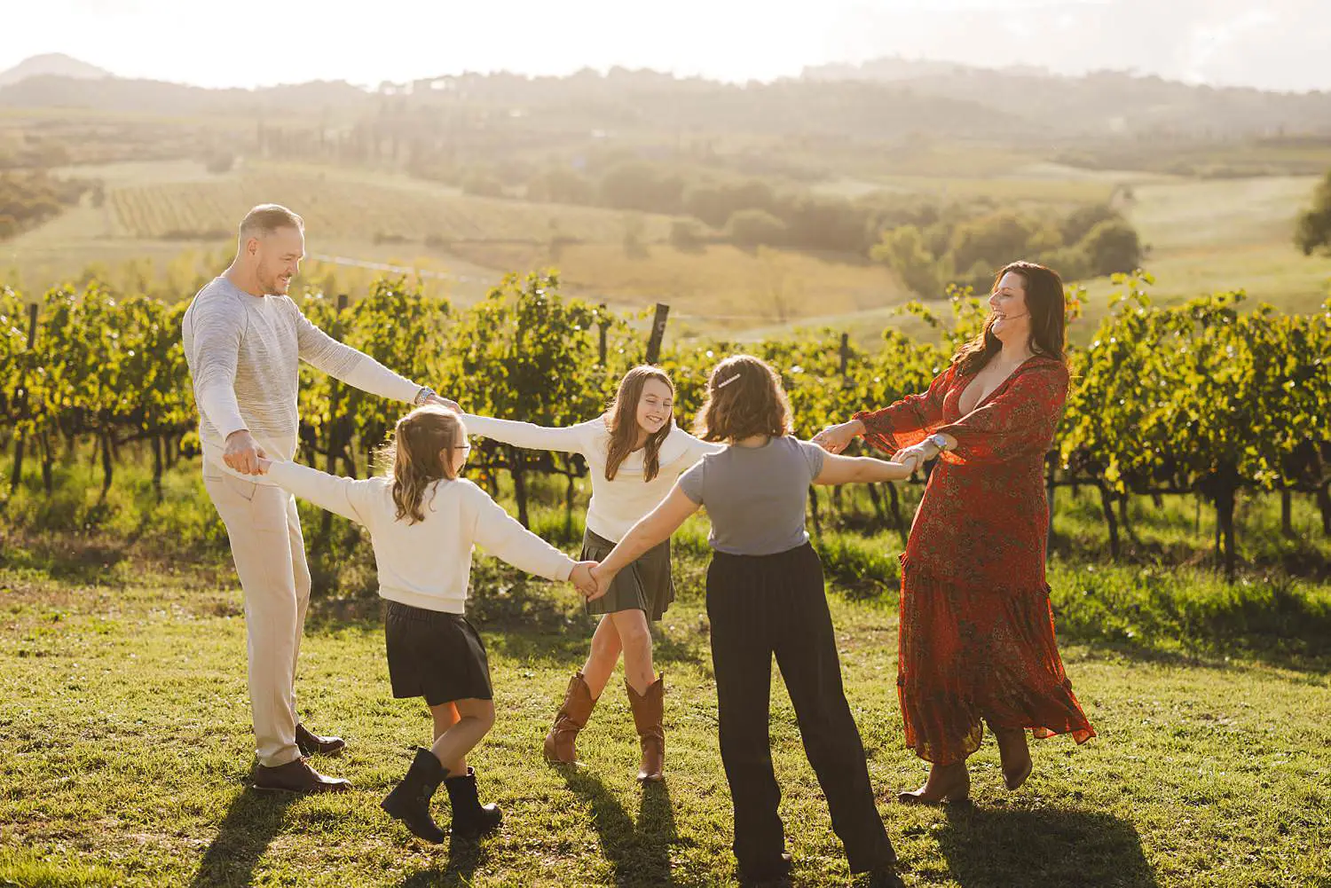 Family photographer in Tuscany at Terra Antica Winery Resort Siena countryside in the Val d’Orcia