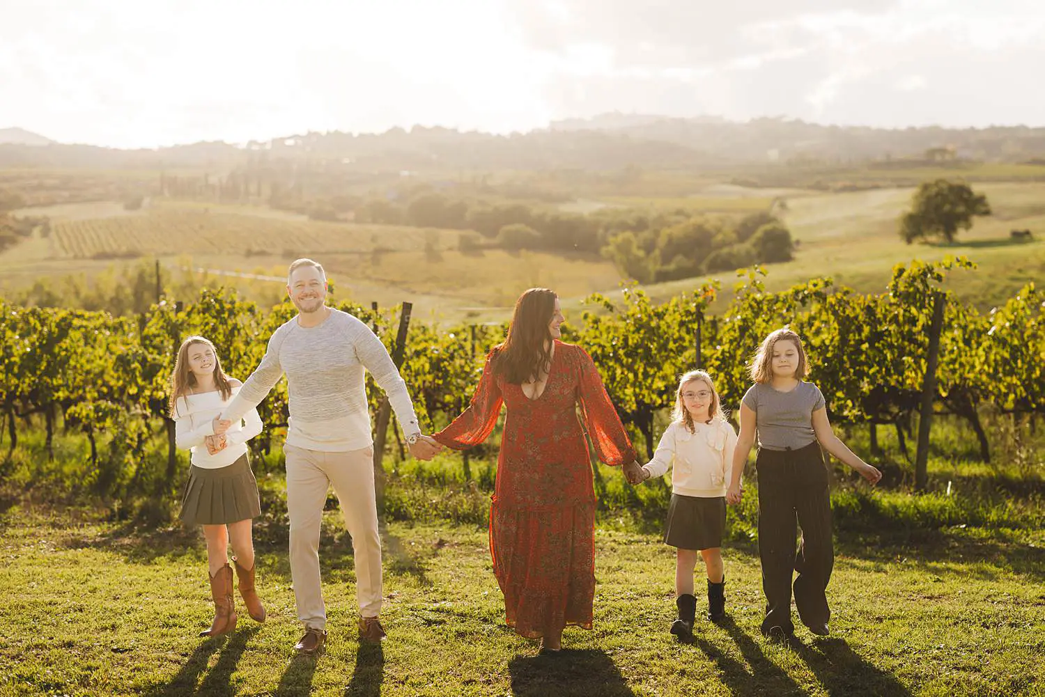 Candid and spontaneous family photographer in Tuscany Italy at Terra Antica Winery Resort in Siena