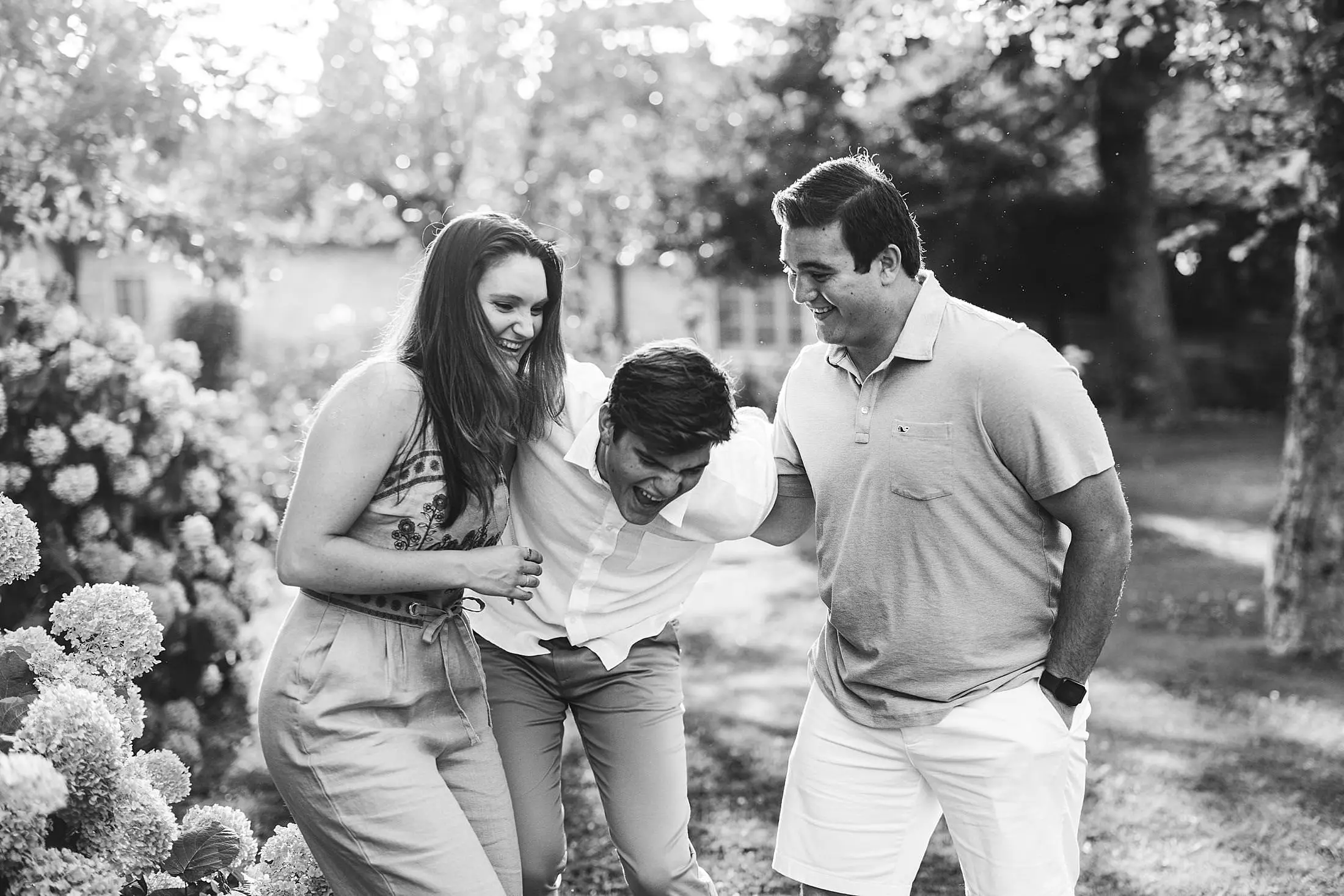 Spontaneous and joyful candid family photo shoot in Tuscany at luxury estate of Borgo San Felice