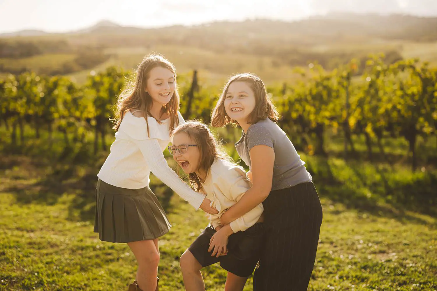Candid and spontaneous family photographer in Tuscany Italy at Terra Antica Winery Resort in Siena