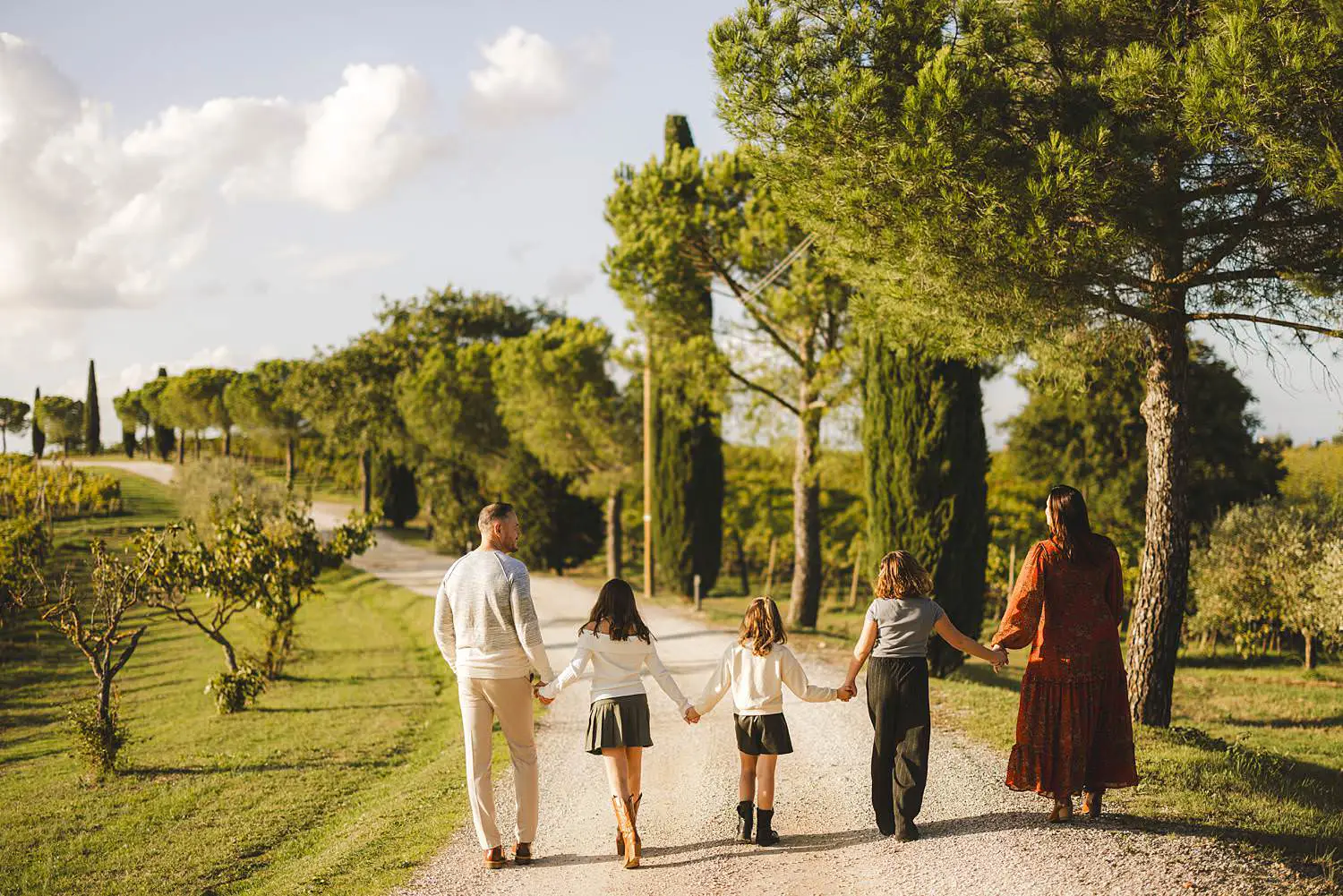 Family photographer in Tuscany at Terra Antica Winery Resort Siena countryside in the Val d’Orcia