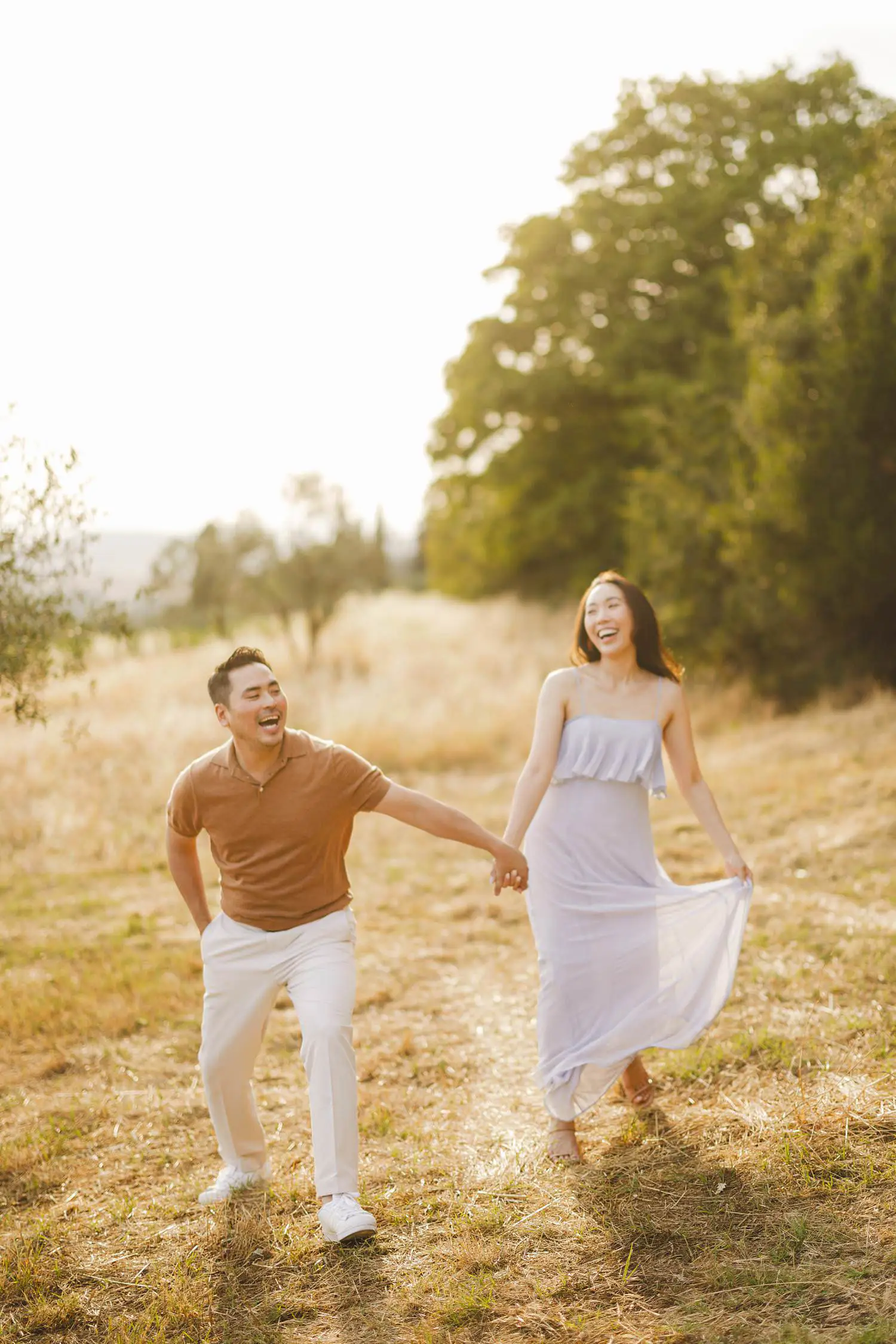Engagement photo shoot experience filled with laughter, connection, and genuine emotion in the countryside of Pienza