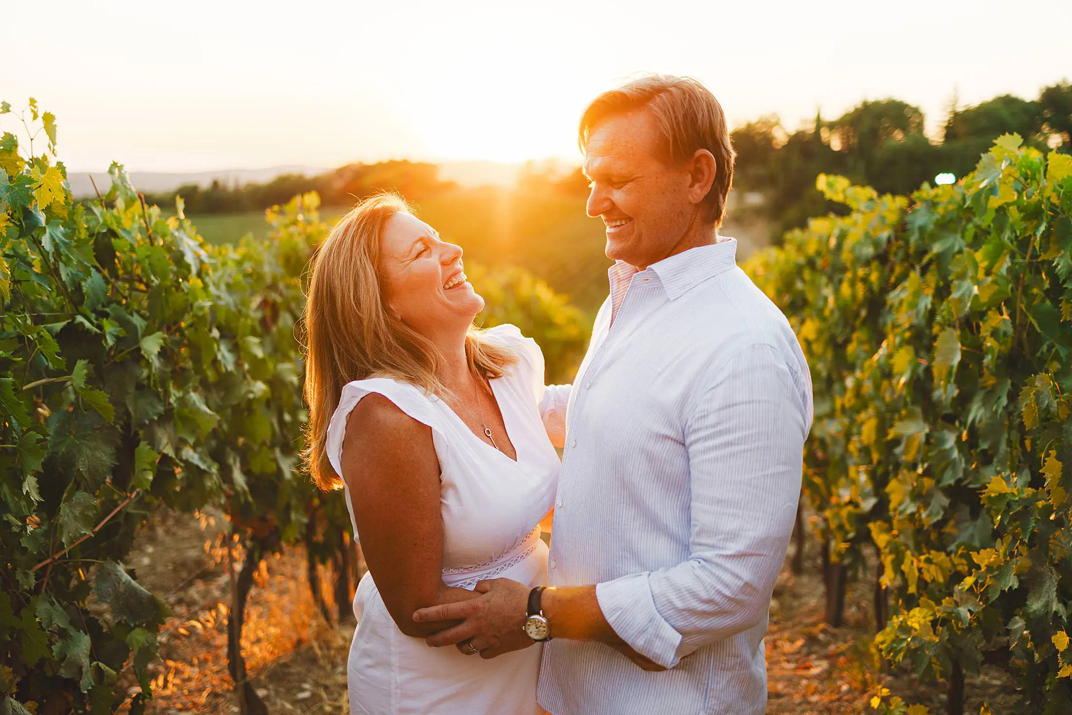 Candid family photos among vineyards and golden light at Borgo San Felice