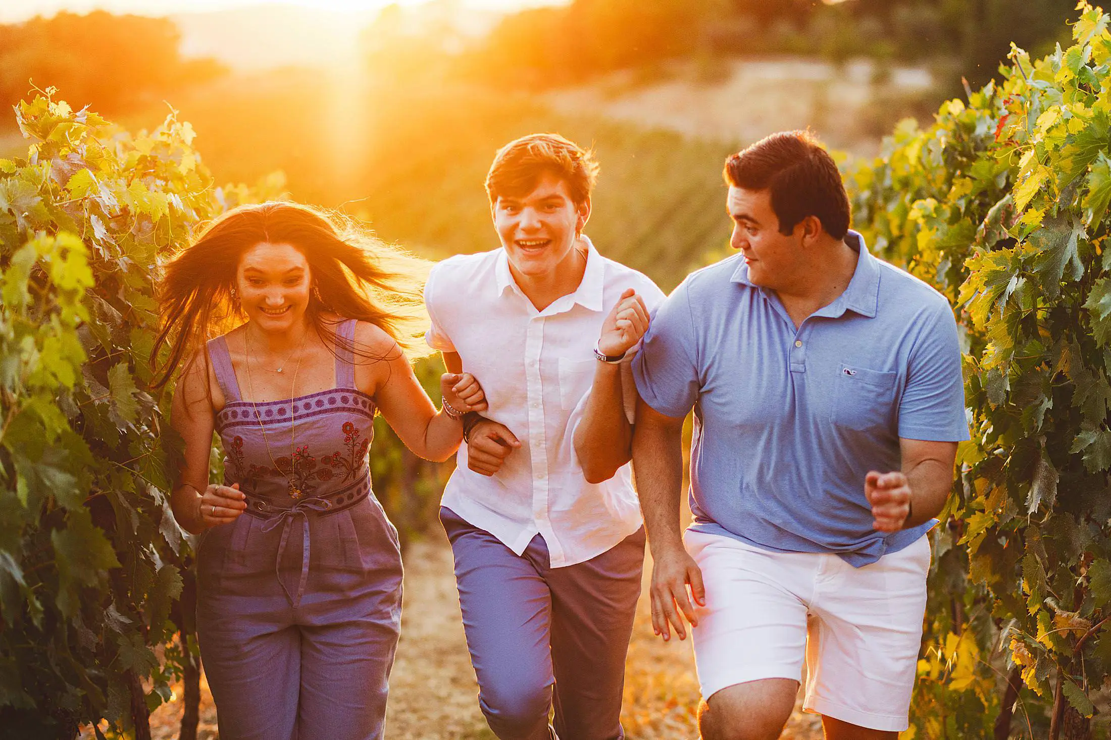 Spontaneous and joyful candid family photo shoot in Tuscany at luxury estate of Borgo San Felice