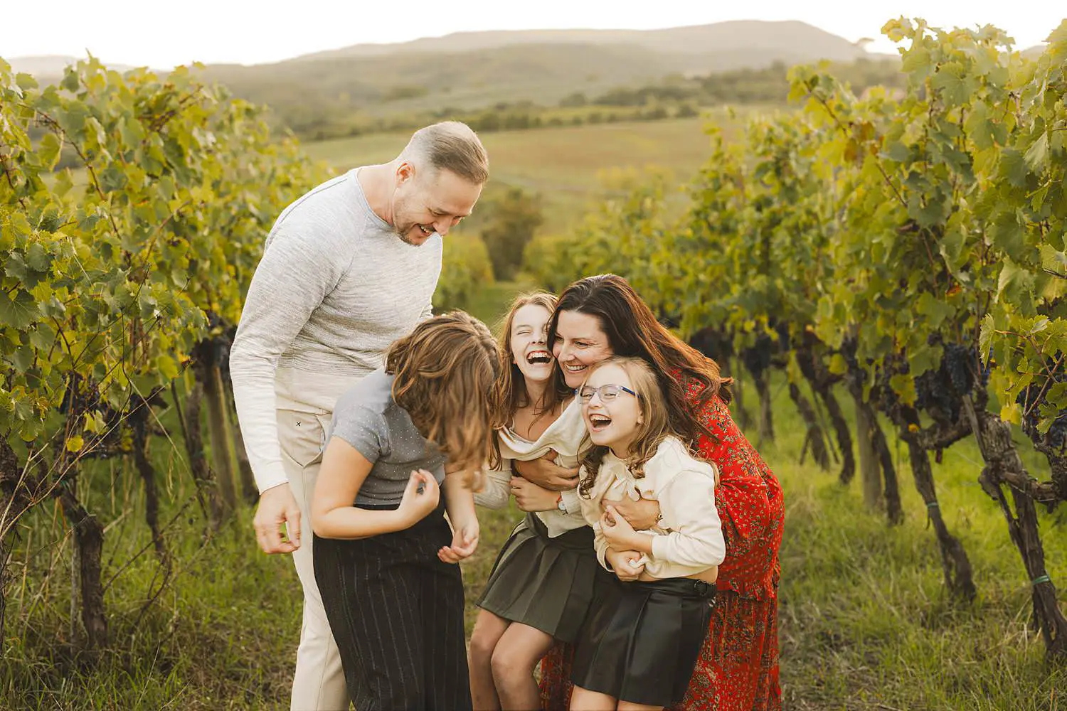 A joyful family photo shoot in Tuscany at Terra Antica Winery Resort