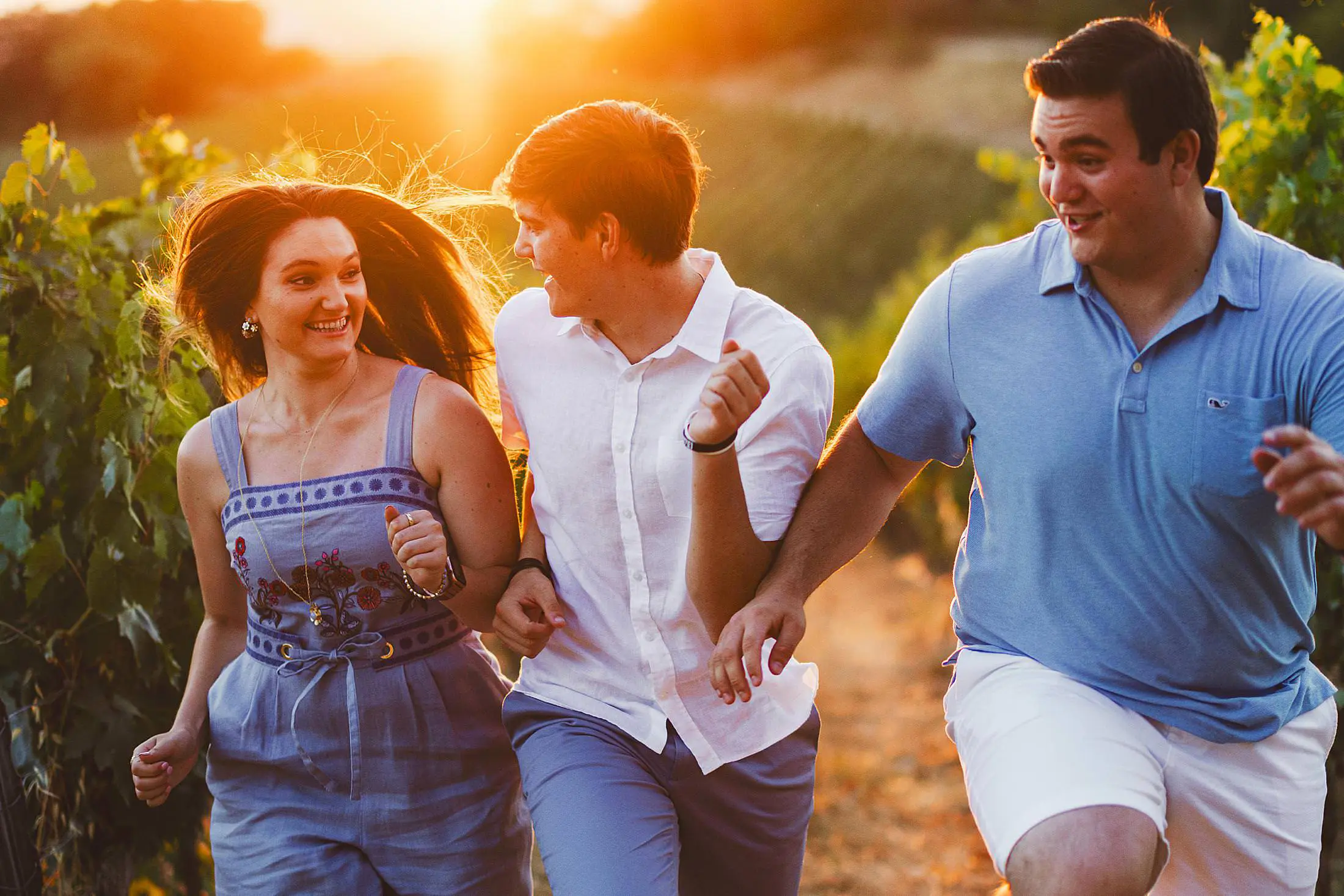 Spontaneous and joyful candid family photo shoot in Tuscany at luxury estate of Borgo San Felice