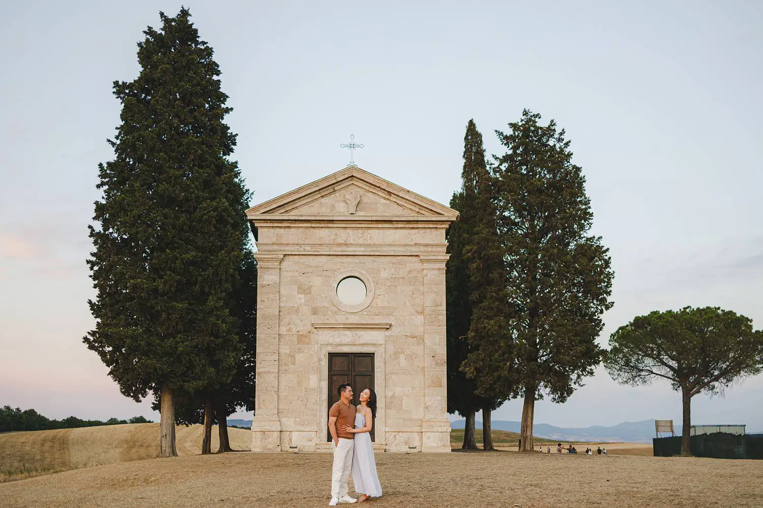 Lovely couple photo shoot at Chapel of Vitaleta in the heart of Val d’Orcia near Pienza