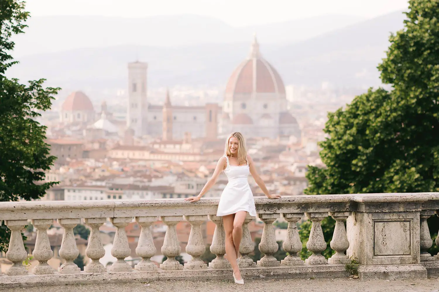 Bride portrait at San Miniato al Monte overlooking Florence Cathedral during a pre-wedding photoshoot.