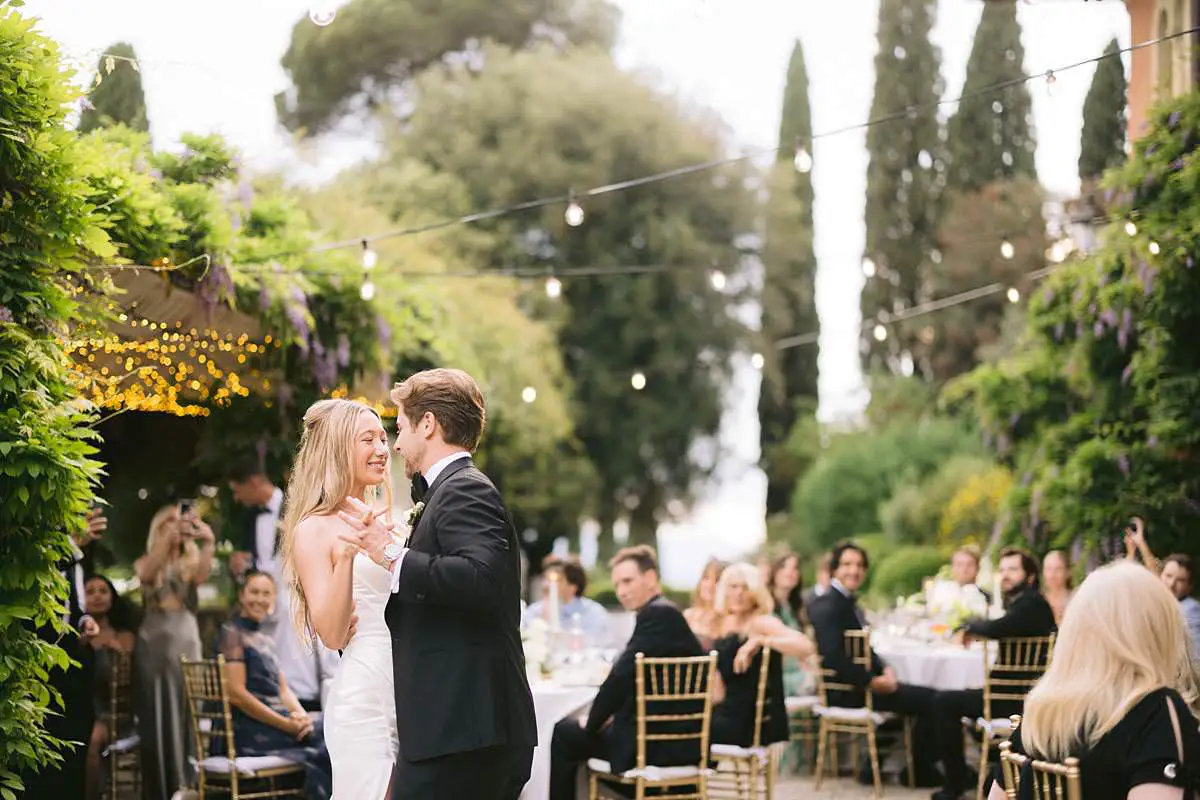 Madison and Travis share their first dance among guests at the Villa Le Fontanelle reception.