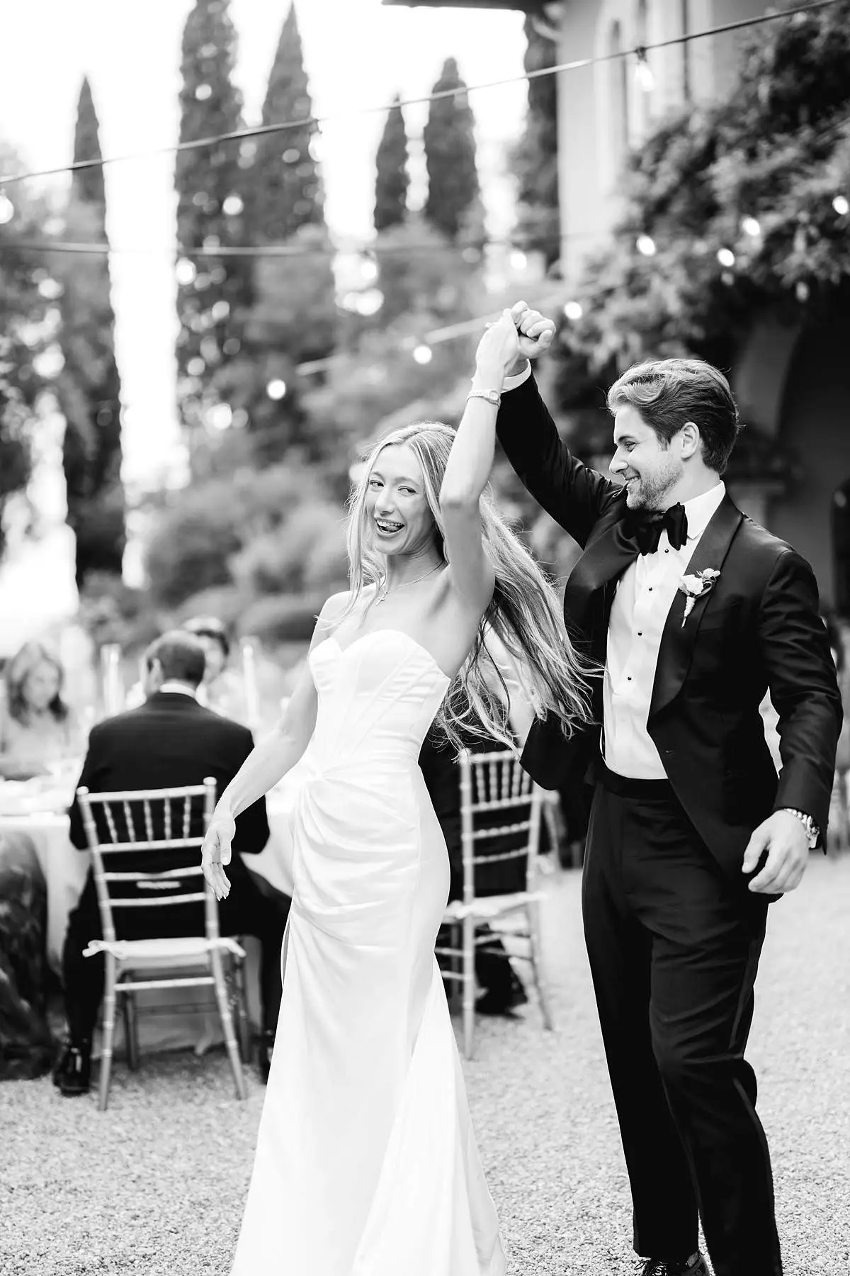 Madison and Travis dance together during their outdoor Villa Le Fontanelle wedding reception.